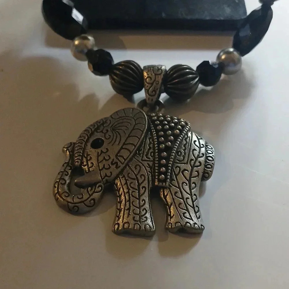Silver and black vintage elephant charm with beaded necklace..stainless..